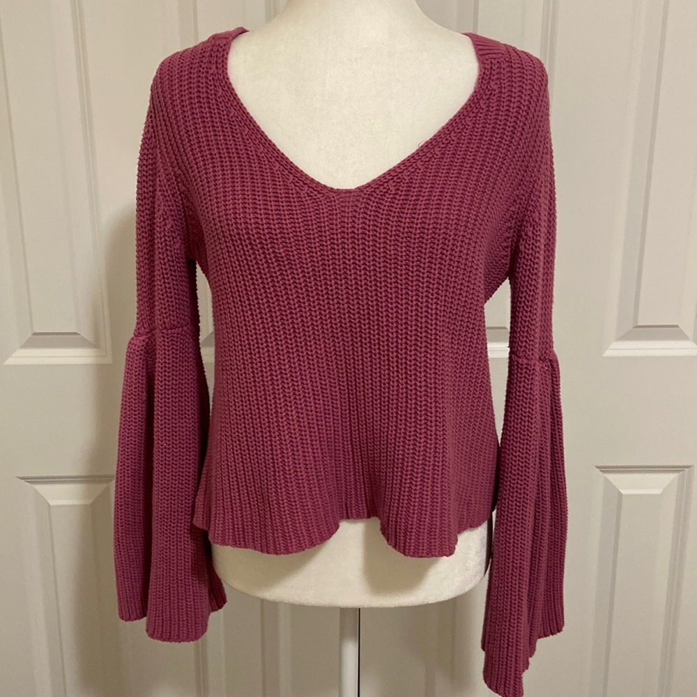 Pink Free People bell sleeve knit sweater